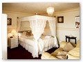 Four Poster Chalet Style Room